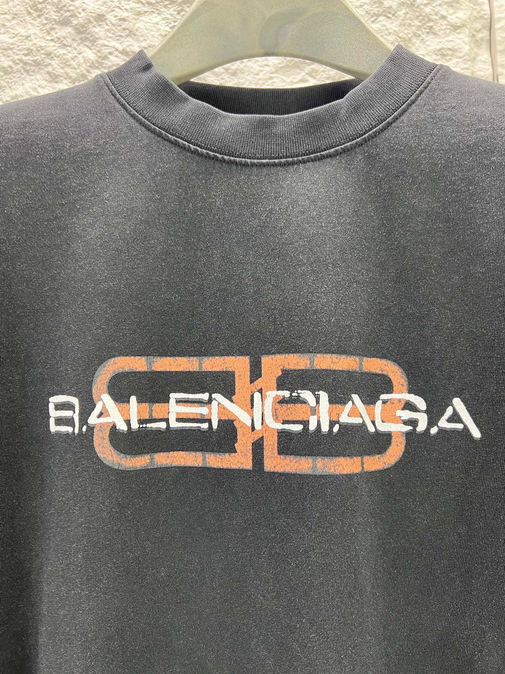 Gray Balenciaga short-sleeve T-shirt with orange and white logo