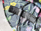 Floral long-sleeve shirt inside label area with multiple black tags