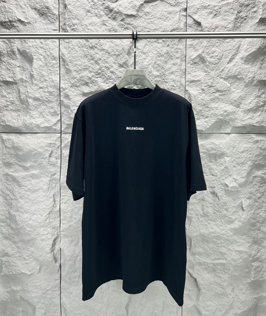 Balenciaga black short-sleeve T-shirt on hanger, crew neck, small chest logo
