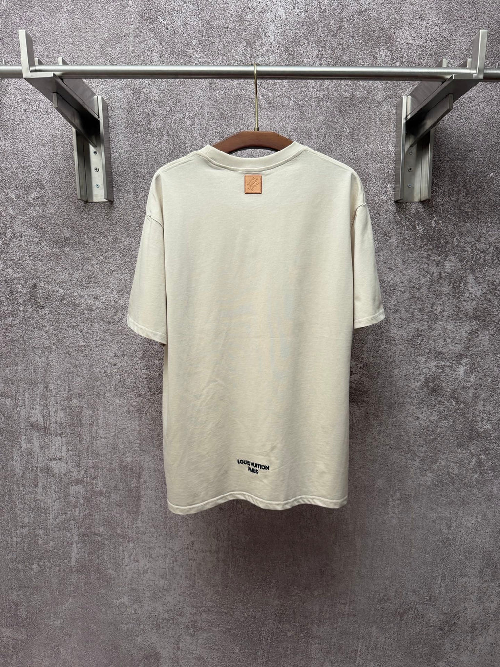 Louis Vuitton T-shirt in light cream with small back logo and crew neckline.