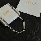 Silver-tone chain necklace with engraved bar and interlocking links