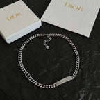 Silver-tone chain choker with engraved bar and small heart charm