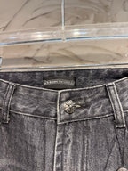 Denim pants waistband with logo patch and front button detail