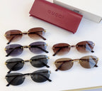 Gucci round sunglasses assortment with gold-tone frames and dark lenses in multiple colors