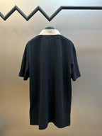 Moncler navy polo shirt back view with cream collar and short sleeves