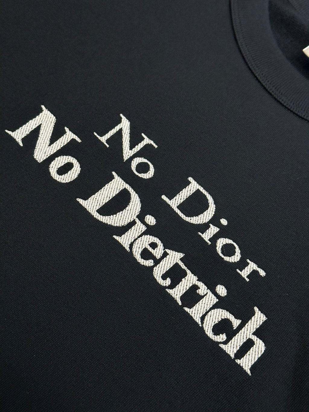 'No Dior No Dietrich' text print on black crewneck sweatshirt