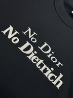 'No Dior No Dietrich' text print on black crewneck sweatshirt