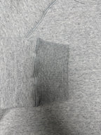 Light gray hoodie with kangaroo pocket and side seam stitching