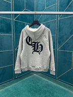 Light gray pullover hoodie with large dark logo on chest
