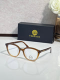 Eyeglasses with tortoiseshell brown round frames and gold-tone temples
