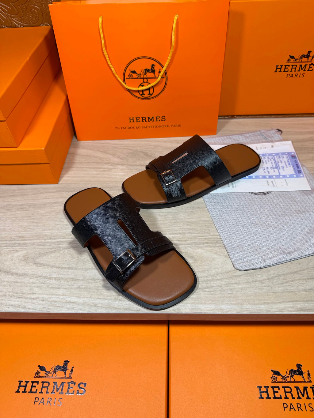 Hermes dark blue sandals with two straps and metal buckles, open toe and flat sole