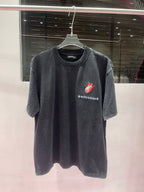Short-sleeve crewneck graphic T-shirt in dark charcoal with red logo on chest