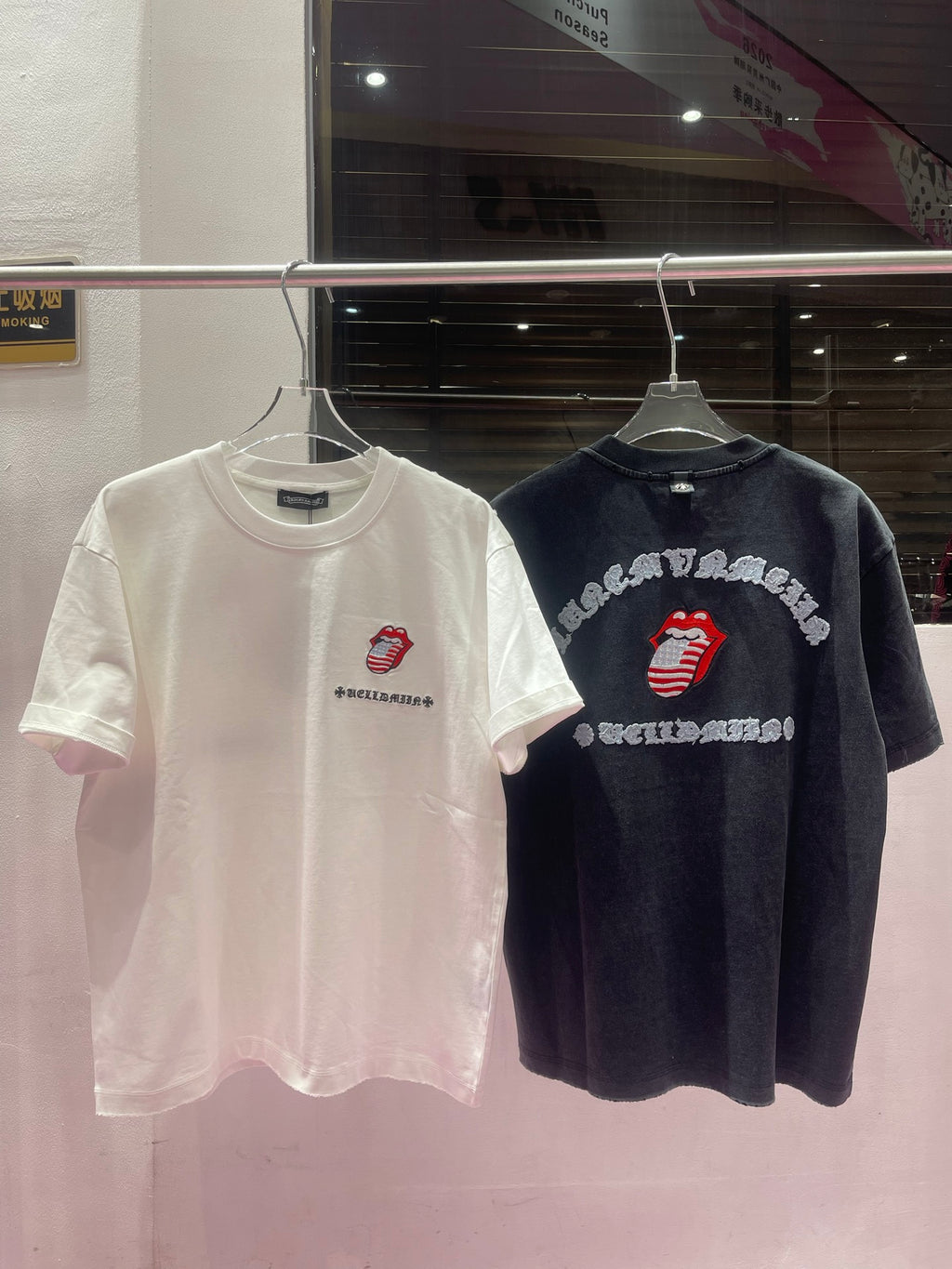 White and dark charcoal graphic crewneck T-shirts with lips logo on chest