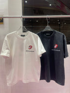 Two short-sleeve crewneck graphic T-shirts: white and dark charcoal with red logo