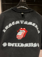 Dark charcoal T-shirt back with large white decorative text arc and red lips logo