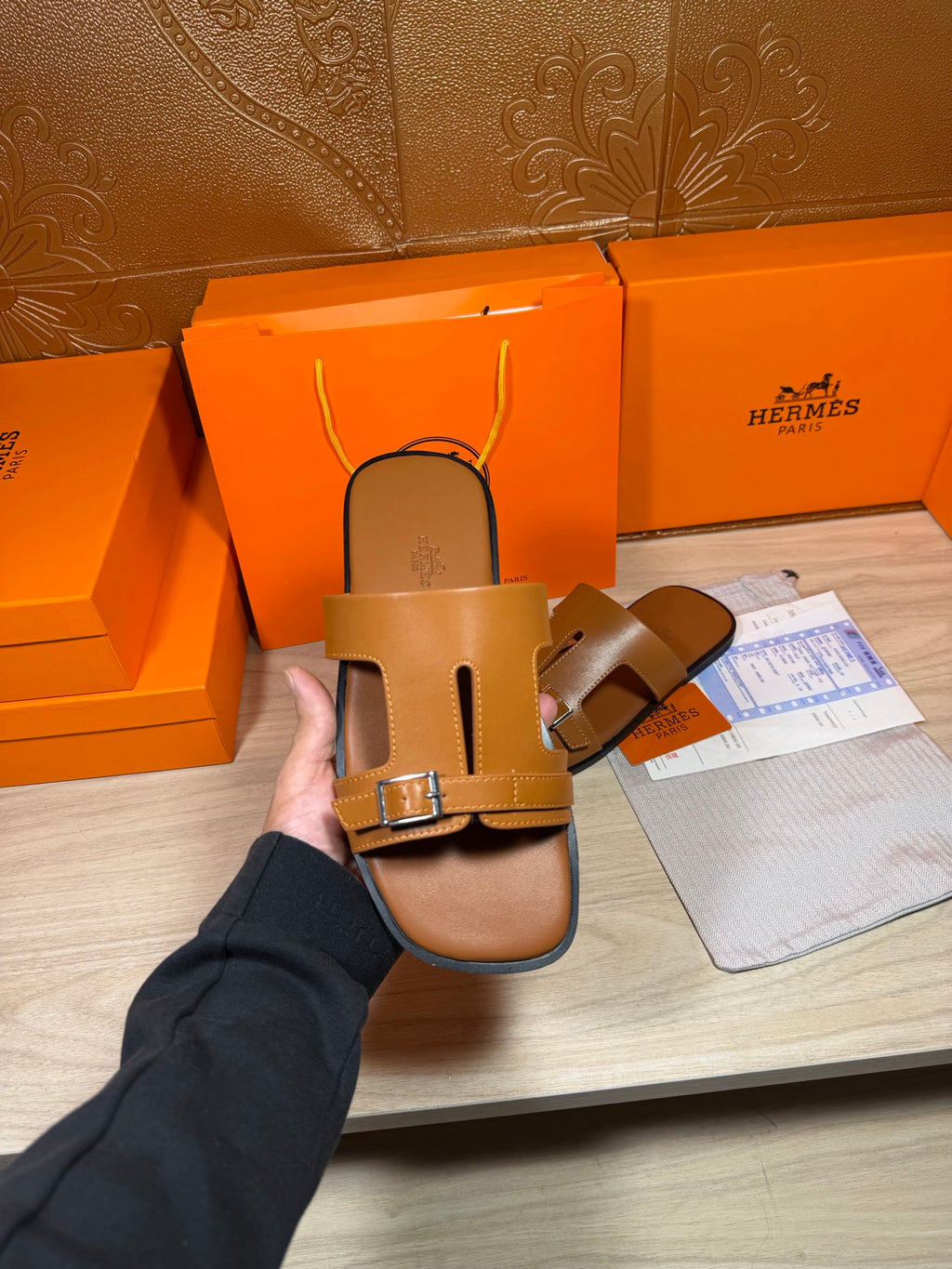Hermes tan leather sandals held with interior footbed facing, front square buckle strap.