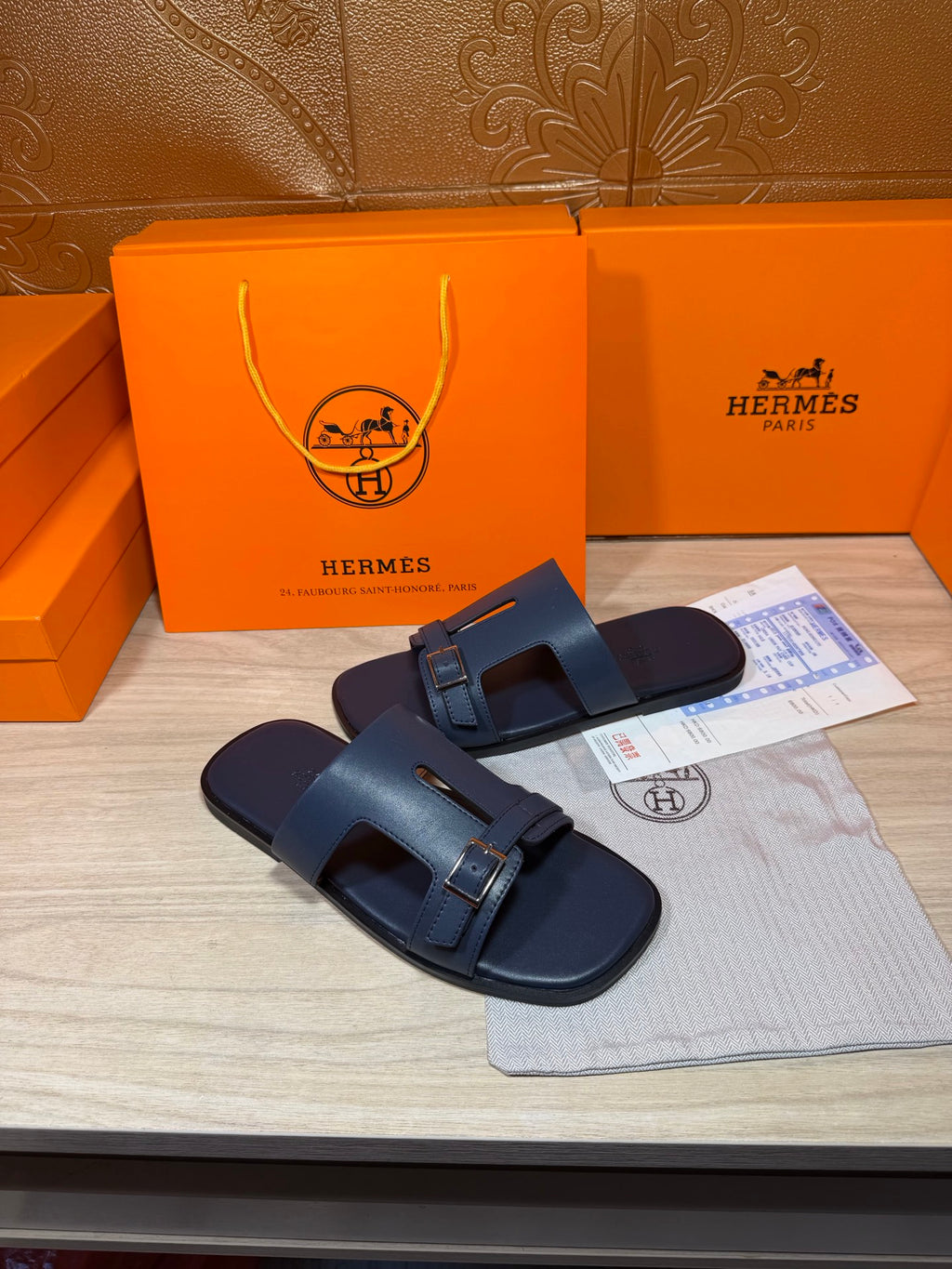 Hermes blue slide sandals, two-strap design with silver buckle on front