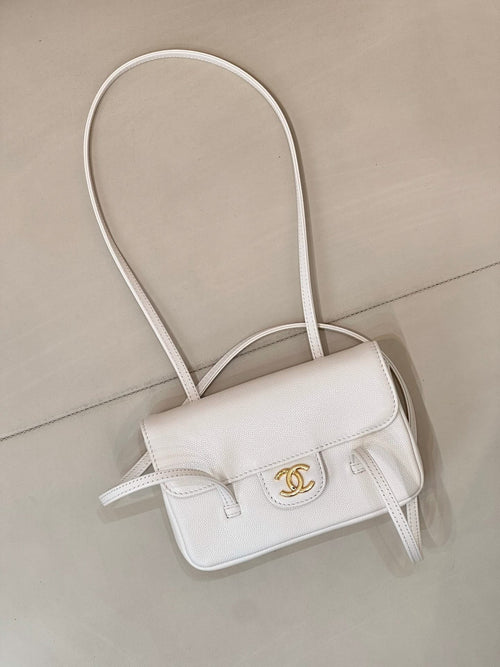 Chanel white leather mini handbag with front flap and CC logo, crossbody straps