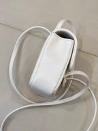 Chanel white leather mini handbag with textured finish and long detachable strap
