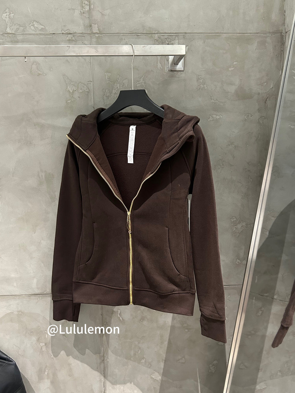 Ralph Lauren brown zip-up hoodie jacket with hood, gold zipper, and side pockets
