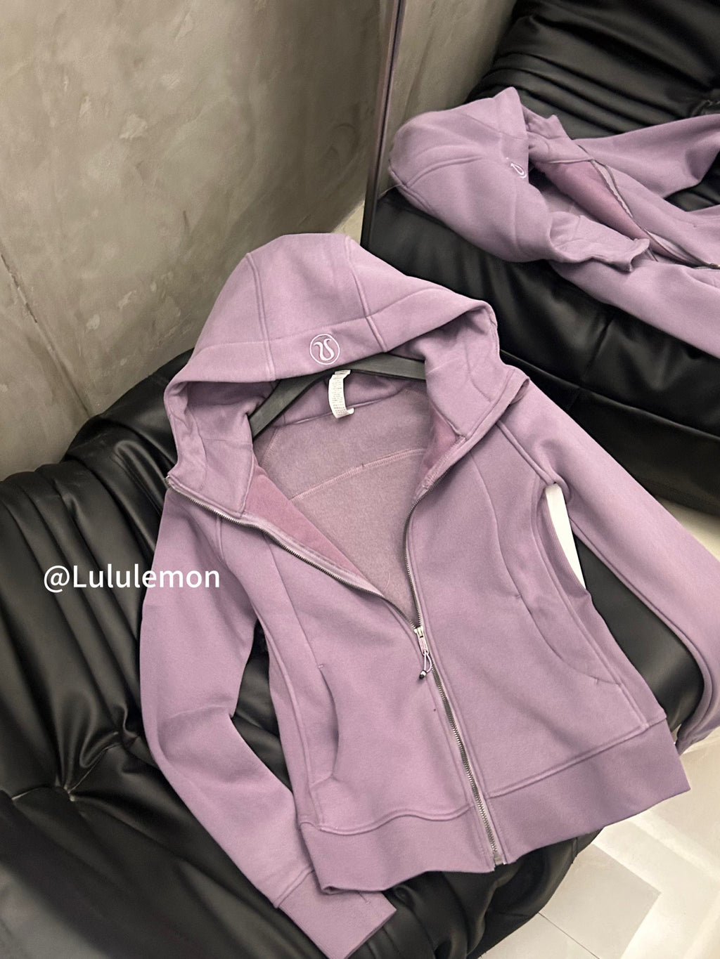 Lavender zip-up hoodie with hood and drawstring, silver zipper