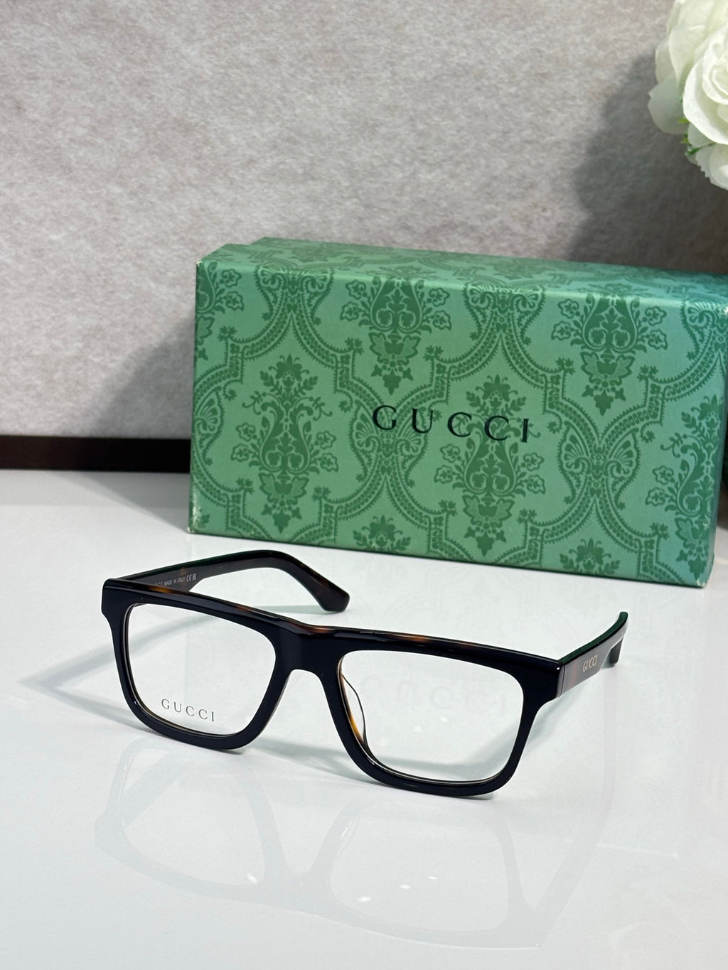 Gucci eyeglasses, dark blue rectangular frames with clear lenses
