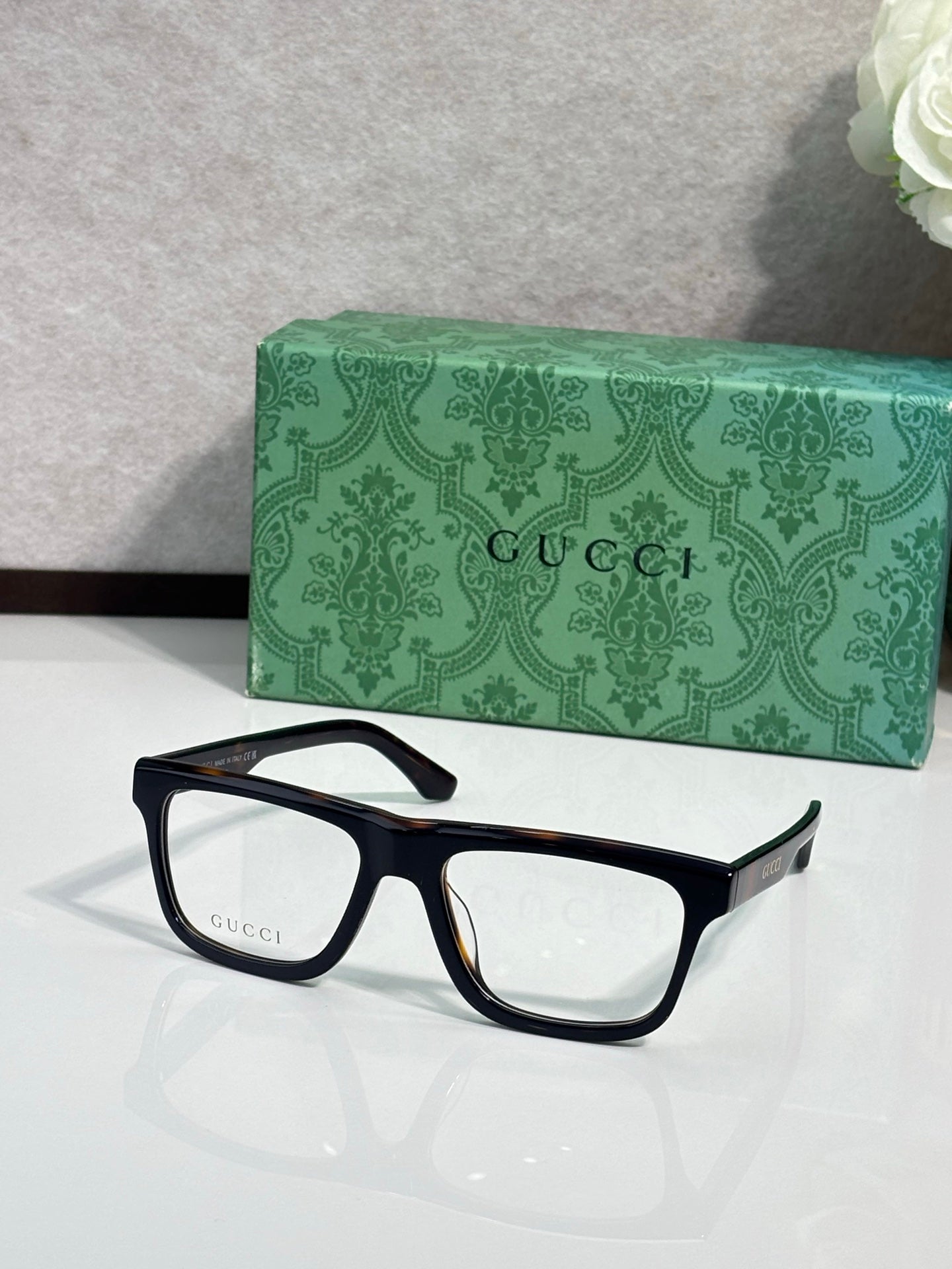 Gucci eyeglasses, dark blue rectangular frames with clear lenses