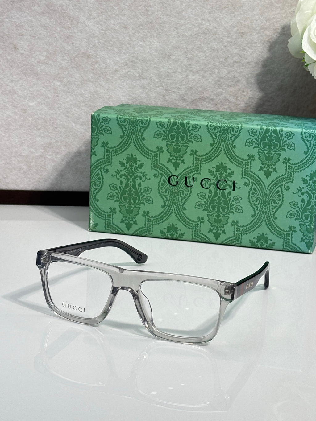 Gucci rectangular eyeglasses, silver-tone frame, clear lenses