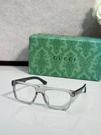 Gucci rectangular eyeglasses, silver-tone frame, clear lenses
