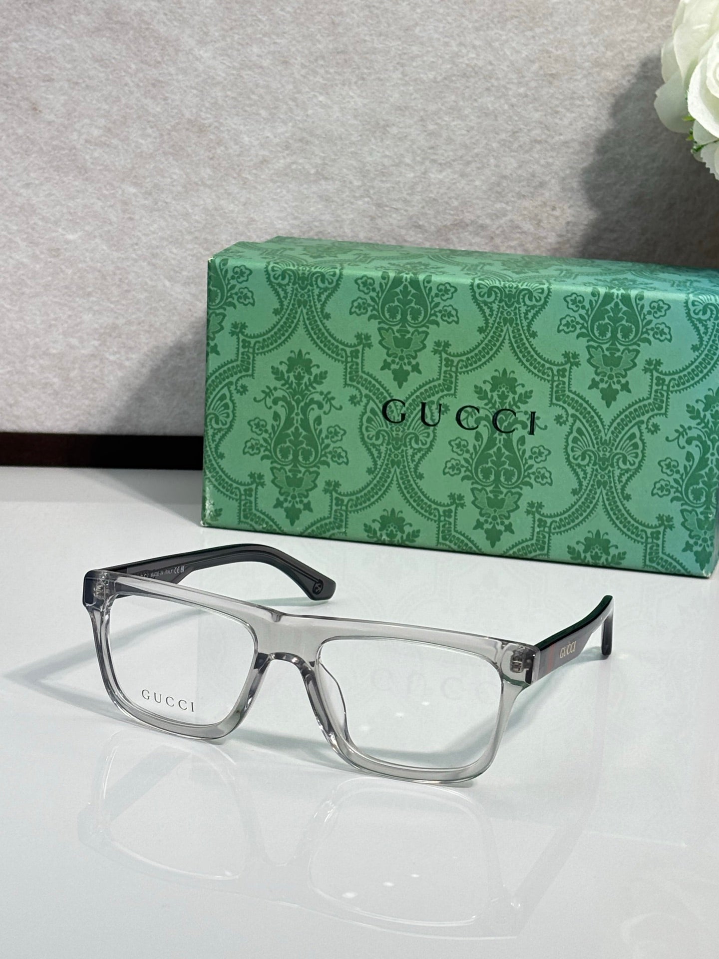 Gucci eyeglasses, silver-tone square frames with clear lenses