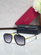Square black acetate sunglasses with dark gray lenses and gold-tone temples