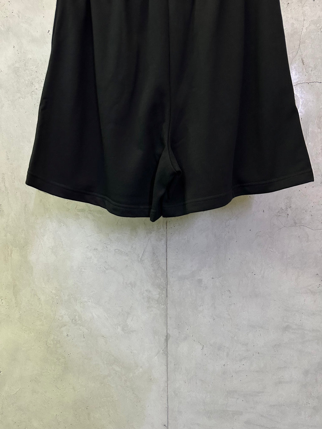 Balenciaga shorts back view in dark black with elastic waistband