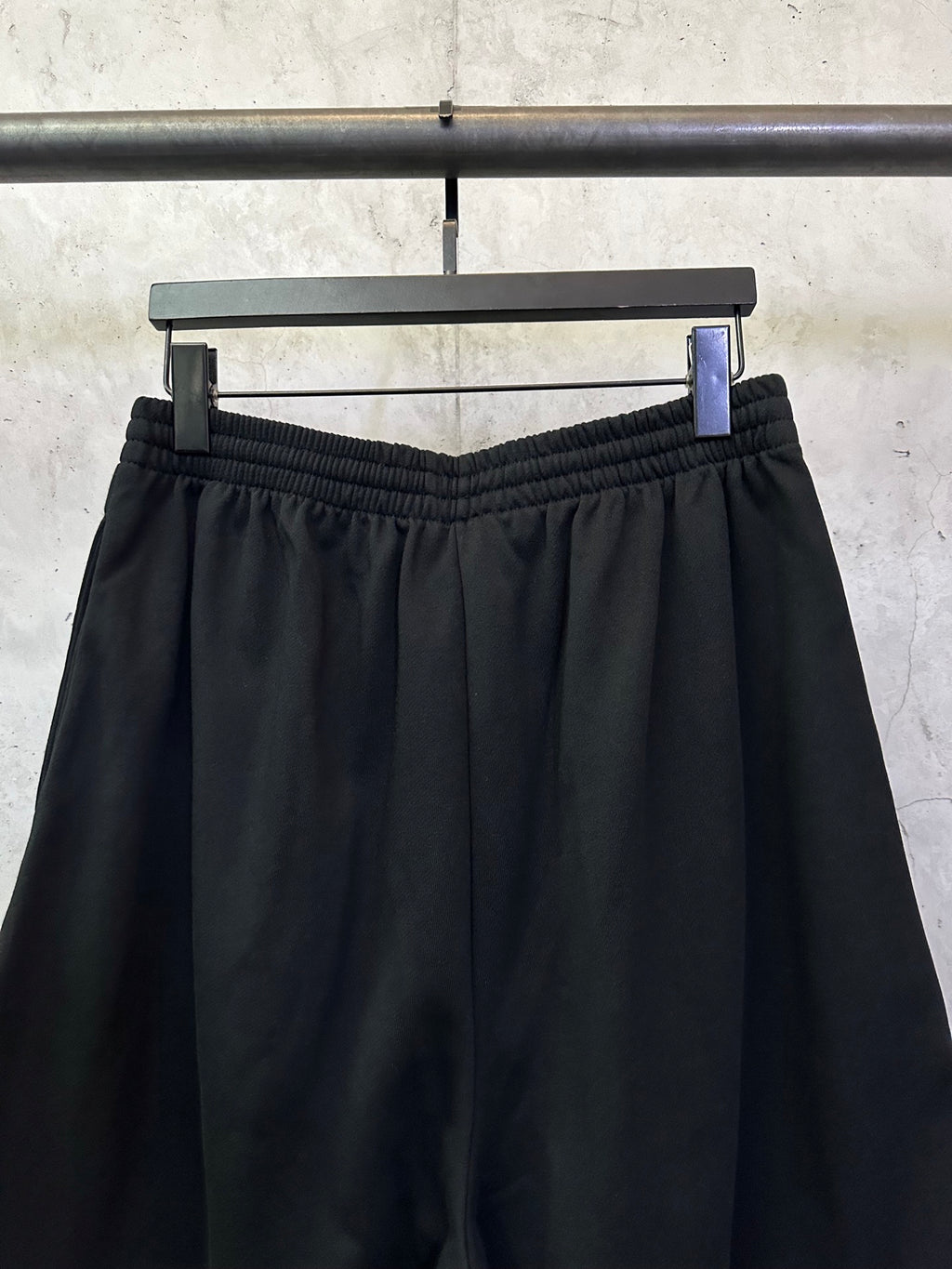 Balenciaga shorts with elastic waistband and pleated front in dark black