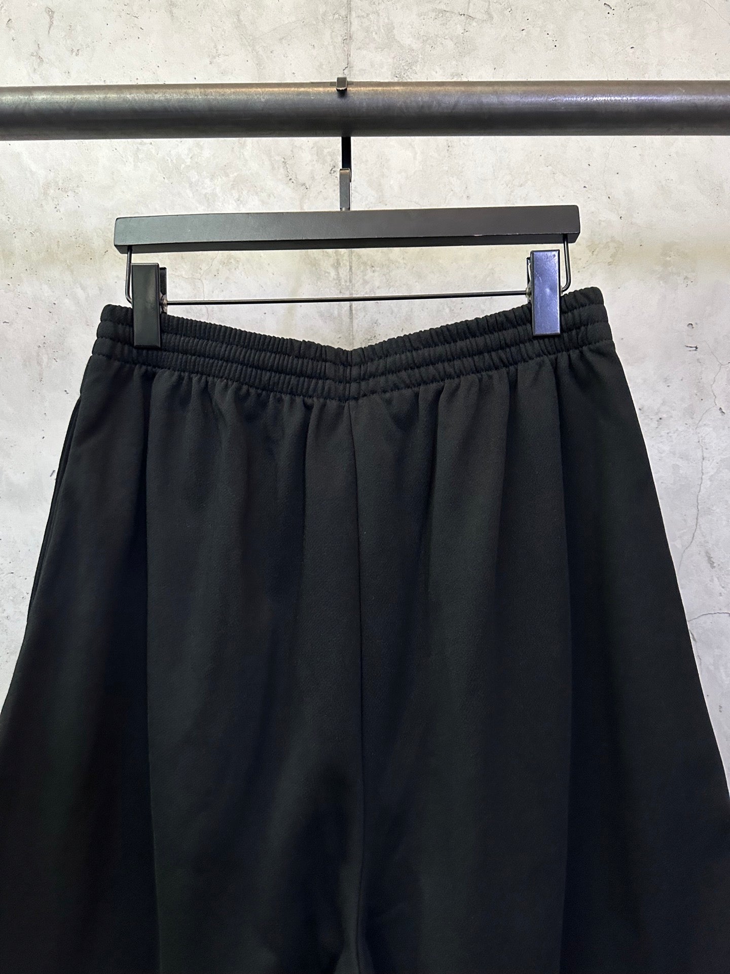 Balenciaga shorts with elastic waistband and pleated front in dark black