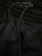 Balenciaga shorts waistband close-up with drawstring and ribbed elastic