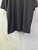 Balenciaga dark short-sleeve T-shirt hem and drape