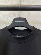 Balenciaga dark crewneck T-shirt with neckline logo tag