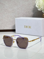 Dior sunglasses with purple-tinted lenses and gold-tone oversized square frames