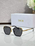 Dior sunglasses with dark lenses and gold-tone oversized square frames