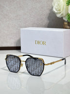 Dior sunglasses with patterned dark lenses and gold-tone square frames