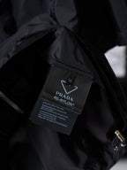 Prada dark jacket interior care label tag