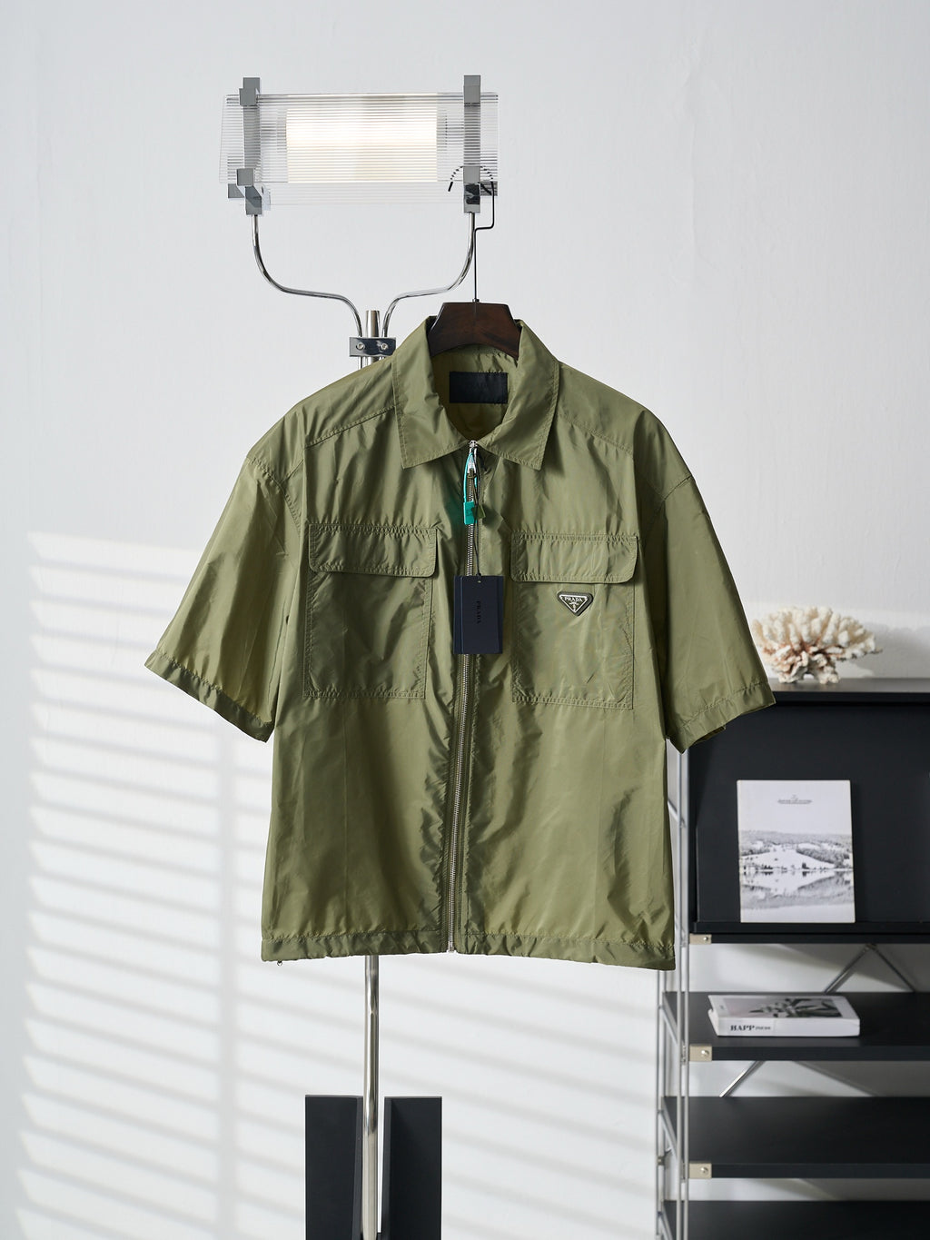 Olive green Prada short-sleeve jacket with stand collar, zip front, chest pockets