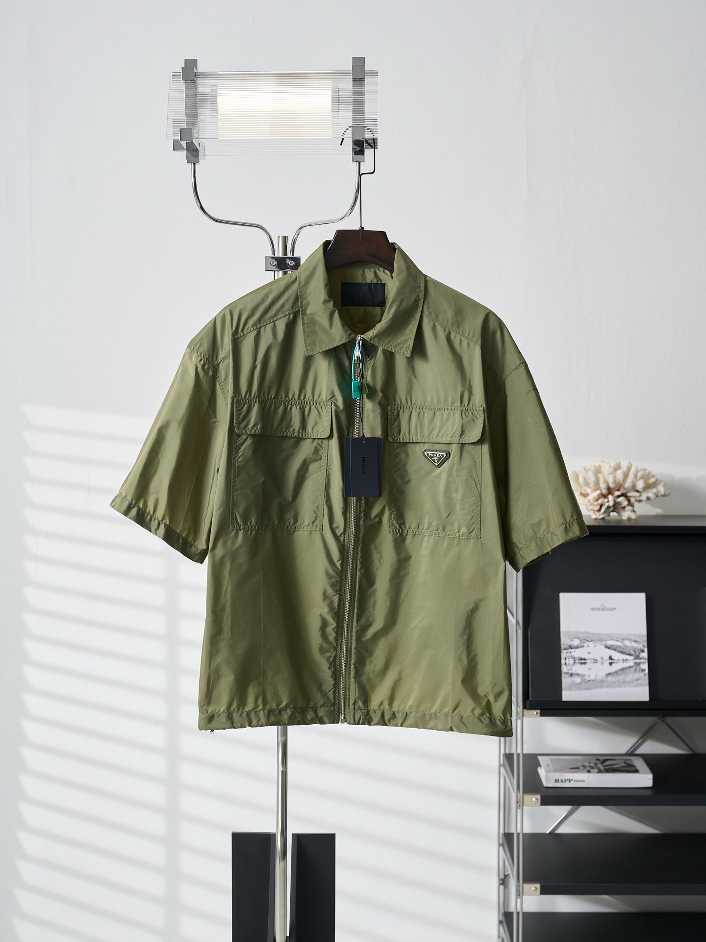 Olive green Prada short-sleeve jacket with stand collar, zip front, chest pockets