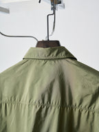 Olive green Prada short-sleeve jacket back with gathered yoke and stand collar