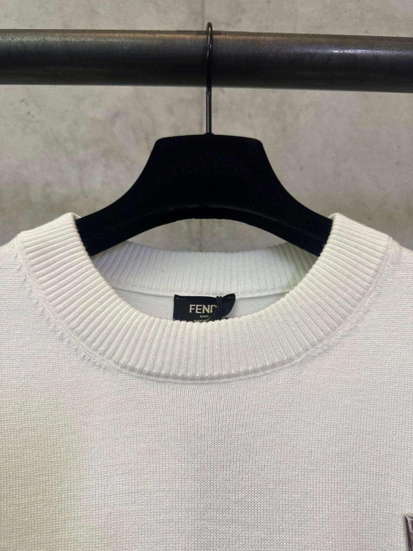 Fendi cream crewneck sweater neckline with ribbed collar and inner tag