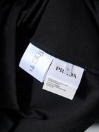Prada polo interior label and care tags on black fabric