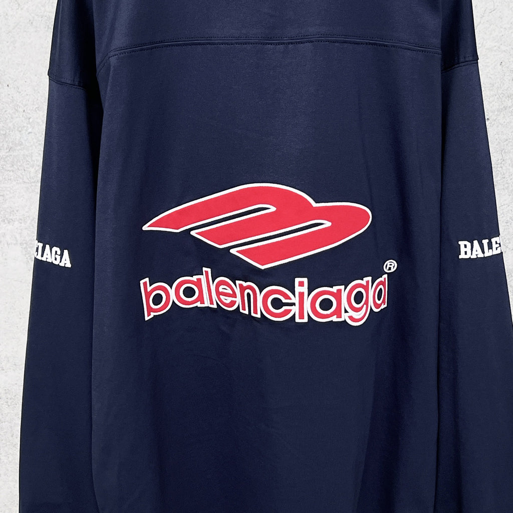 Balenciaga navy long-sleeve sweatshirt with large red-and-white Balenciaga logo on back