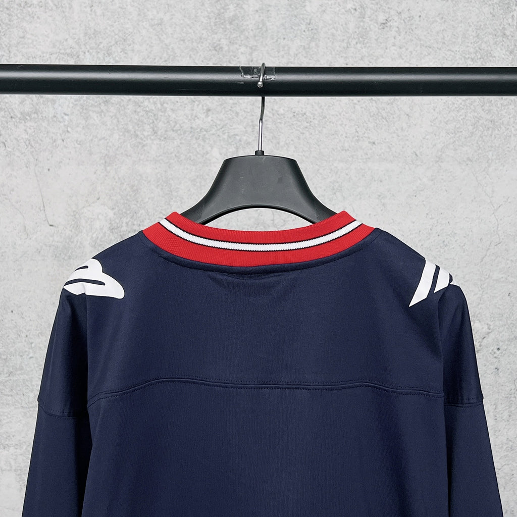 Balenciaga navy long-sleeve sweatshirt back with red-and-white striped ribbed collar