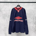 Balenciaga navy long-sleeve sweatshirt with red-and-white striped collar and crest logo
