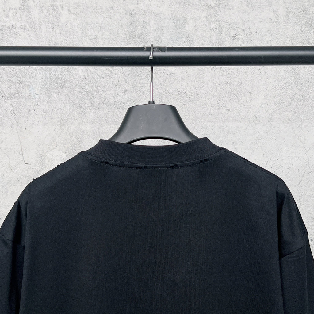 Graphic T-shirt back, black crewneck with no visible print